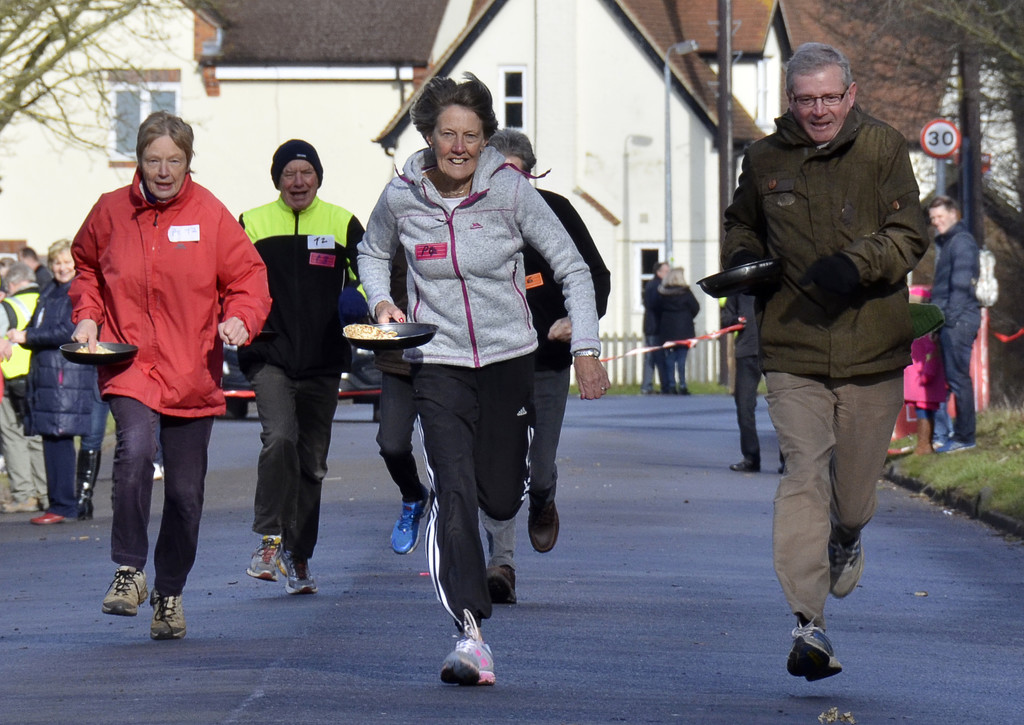 Annual pancake race in Silsoe